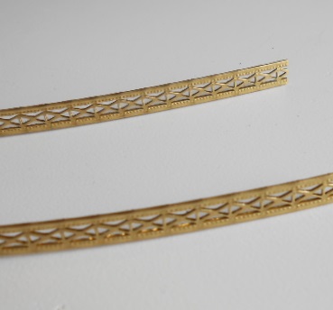 Moldura de latón
